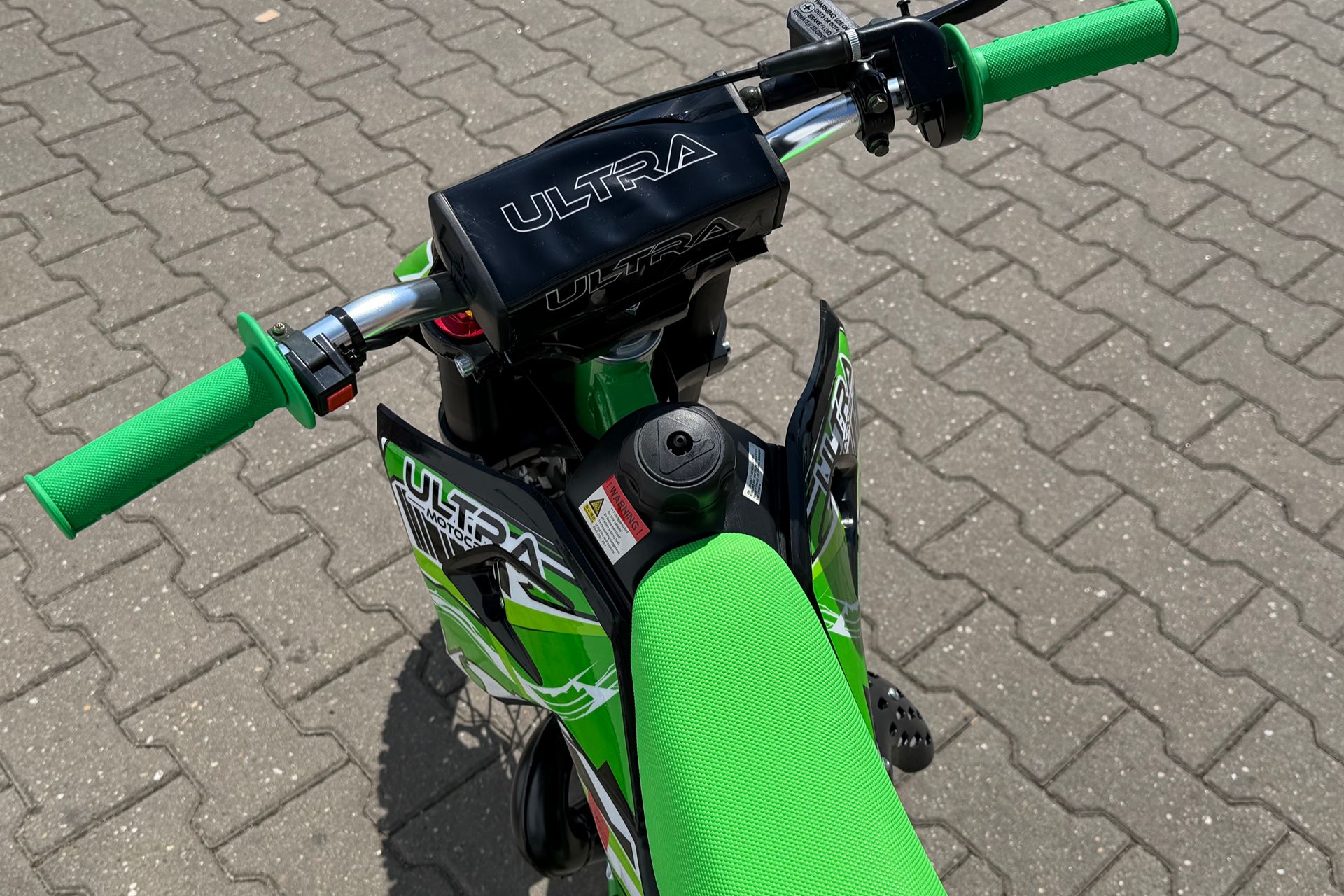 Crossmotor KOSHINE 50cc - Ultra Motorcross close up stuur groen